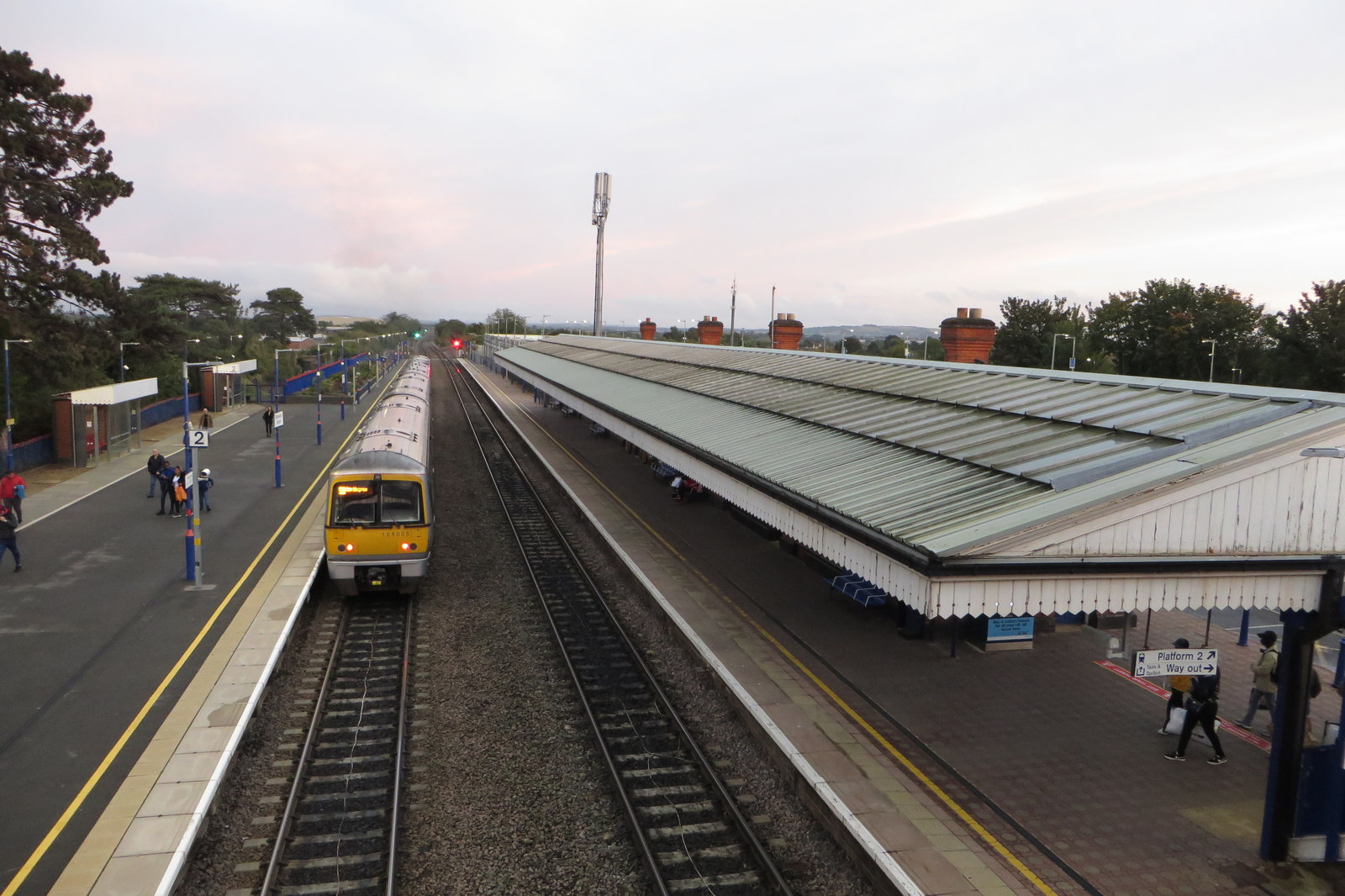 Chiltern Railways train calling at Platform 2 of Bicester North railway station, photographed from the footbridge in September 2019.