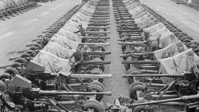 Rows of 40mm Bofors anti-aircraft guns on mountings at the Central Ordnance Depot in Bicester, photographed on 4 April 1944.