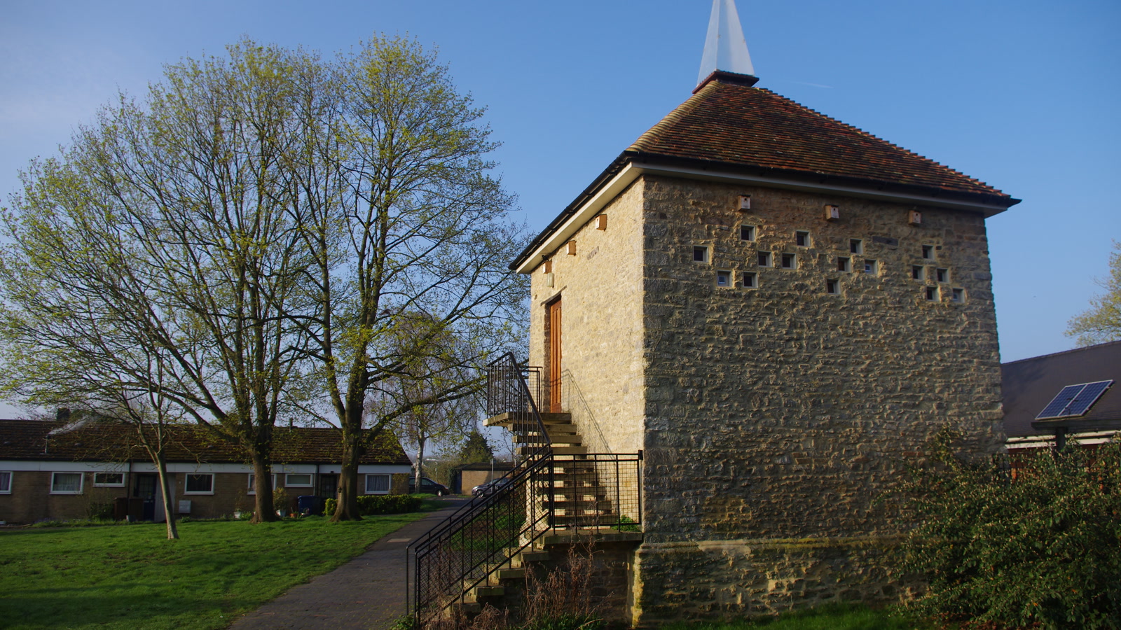 Circular stone dovecote at Old Place Yard, on the historical precinct grounds of Bicester Priory.
