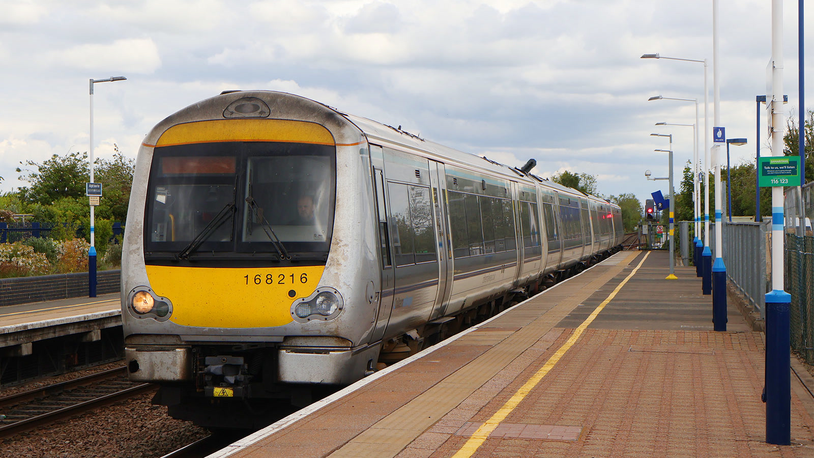 Chiltern Railways train stopped at the platform at Bicester North station.