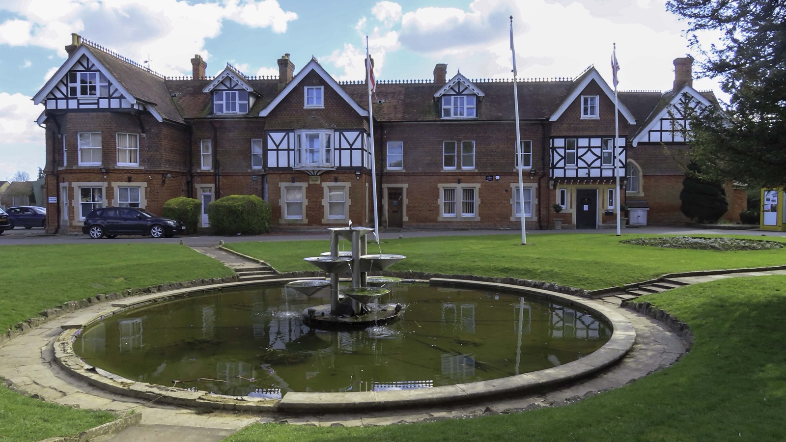 Garth House with its Victorian gables and ornamental fountain in Garth Park, Bicester, photographed in February 2021.