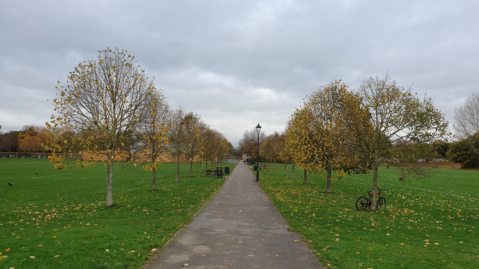 Open green grounds of Pingle Playing Fields in Bicester looking toward Old Place Yard, photographed in November 2022.